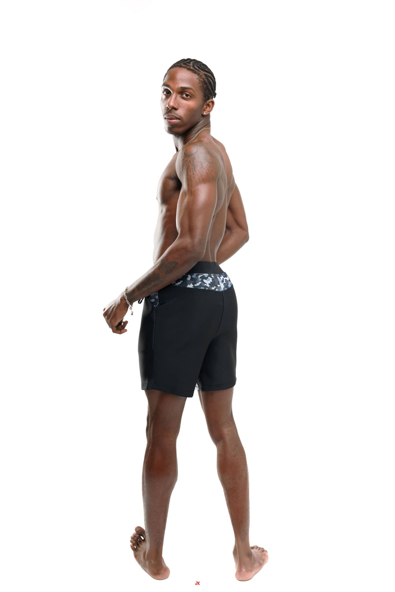 G180 Swim modern fit men's swim shorts 6in in black, side view for comfortable beachwear