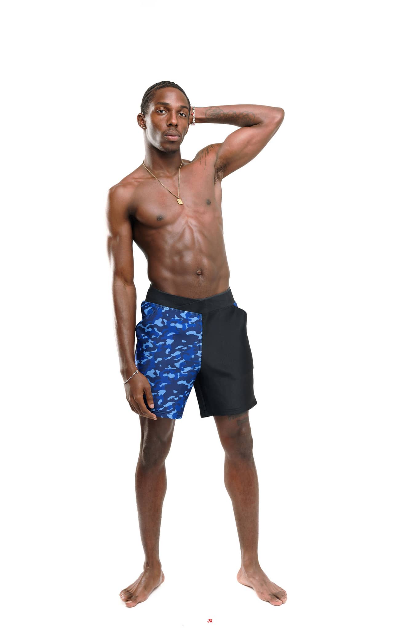 G180 Swim fashionable swim trunks in blue camo and black, designed for stylish beachwear