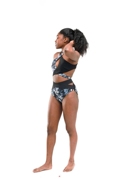 Model wearing stylish G180 Swim perfect 10 bikini bottoms in floral print, showcasing high waisted comfort